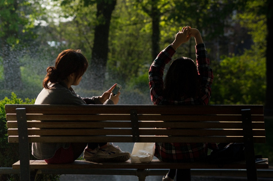 bench-people-smartphone-sun-large.jpg